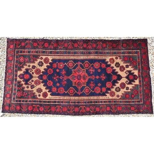 625 - A Persian Malayer rug, the camel ground centred by a medallion, 222 cm x 120 cm