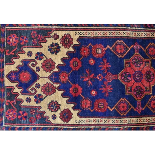 625 - A Persian Malayer rug, the camel ground centred by a medallion, 222 cm x 120 cm