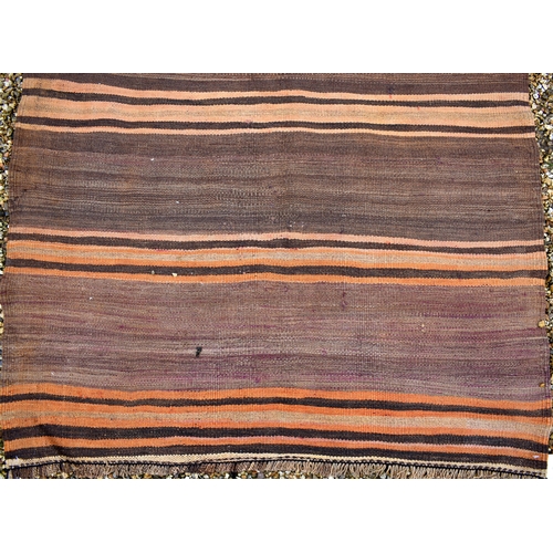 628 - A brown ground Azari kelim wide runner with repeating striped design, 420 x 95 cm (worn)