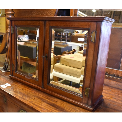 680 - A small wall hanging walnut two door cabinet with mirrored doors to/w inlaid walnut swing table mirr... 