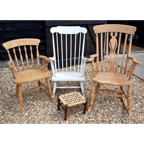 694 - A beech rocking chair, painted rocking chair, beech carver chair and rush worked oak stool (4)