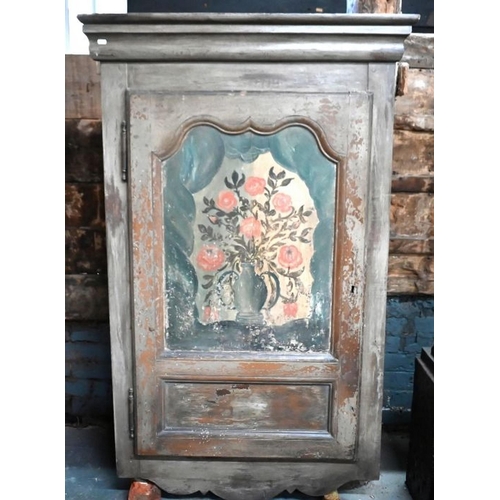 80 - A pair of 19th century continental painted pine hanging corner cabinets, the polychrome floral decor... 