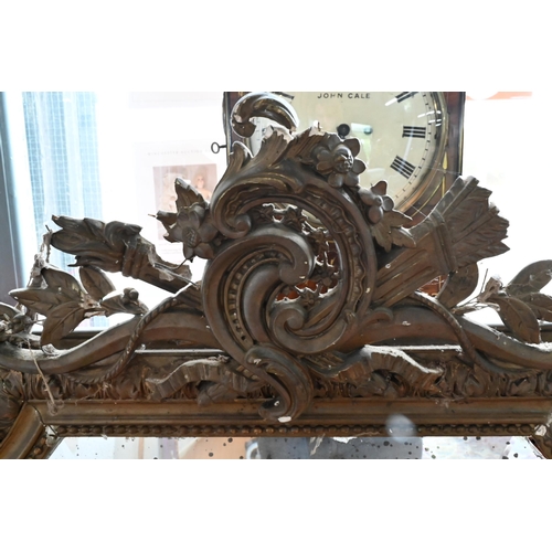 94 - An antique French giltwood and composite framed mirror, with bevel edged plate (heavily distressed/d... 