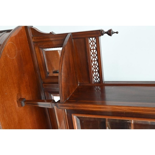 98 - Maple & Co., a late 19th/20th century credenza, with an arrangement of glazed cabinets, open shelves... 