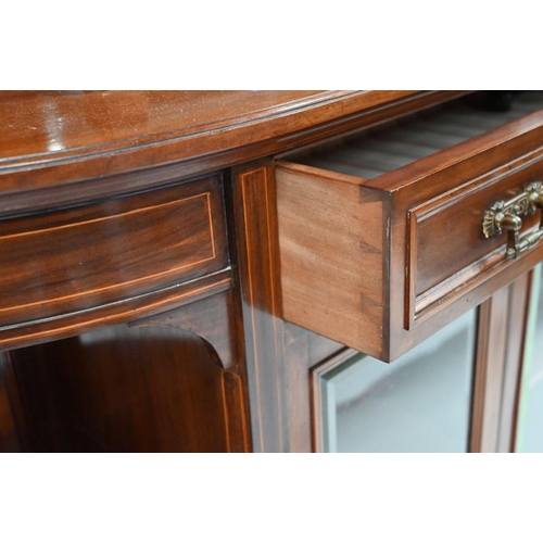 98 - Maple & Co., a late 19th/20th century credenza, with an arrangement of glazed cabinets, open shelves... 