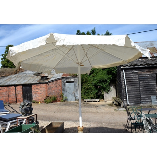 99 - A large garden umbrella on alloy stand, 3 m dia. (boxed new old stock)