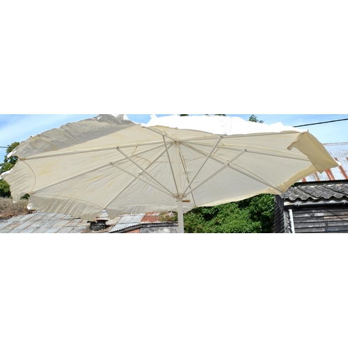 99 - A large garden umbrella on alloy stand, 3 m dia. (boxed new old stock)