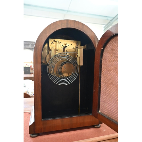 202 - An Edwardian inlaid mahogany bracket clock with three-train movement striking and chiming on coiled ... 