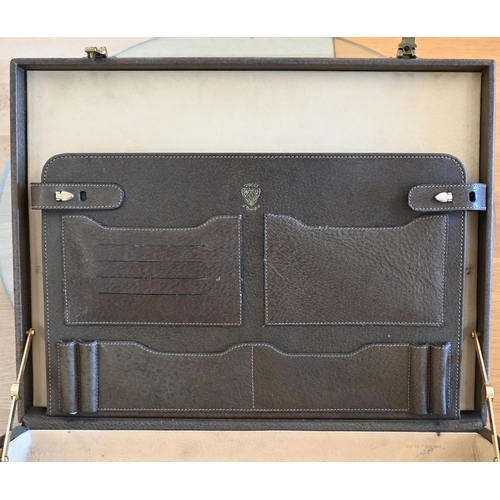 205 - A Gucci leather briefcase with combination locks