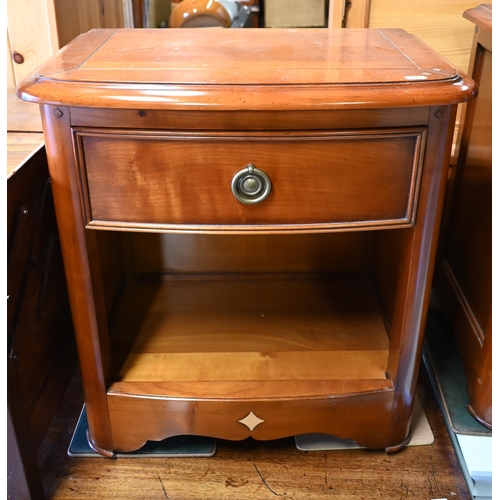 223 - Brigitte Forestier - A pair of cherrywood bedside cabinets each with single drawer over open niche, ... 