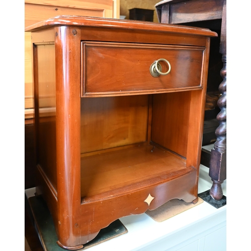 223 - Brigitte Forestier - A pair of cherrywood bedside cabinets each with single drawer over open niche, ... 