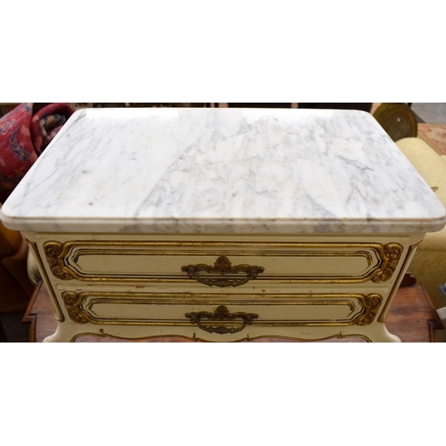 229 - A French cream painted and gilded two drawer bedside table with white marble top, 58 cm w x 35 cm d ... 