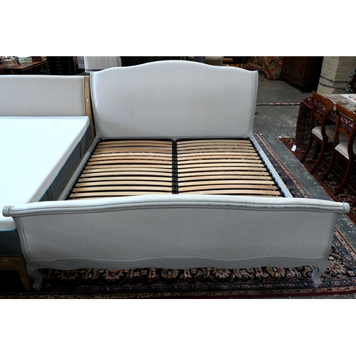 75A - Loaf - A French style 'Joelle' sleigh bed with pale grey linen upholstery and grey painted wood, sup... 