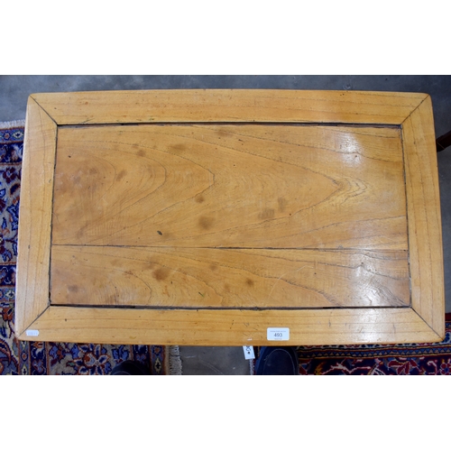 493 - An antique Chinese hardwood low table / stand, with carved apron on shaped legs, 62 cm x 46 cm x 27 ... 