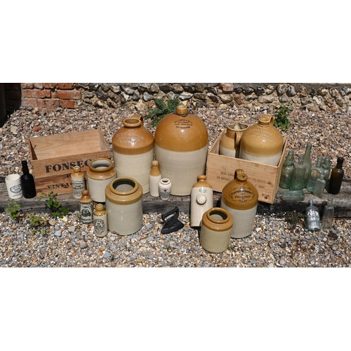 17 - A collection of vintage stoneware flagons, jars glass bottles etc. of varying size/capacity printed ... 
