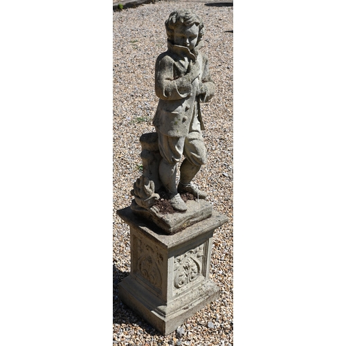 4 - A reconstituted stone garden figure of 'Winter Boy' standing on an emblem cast pedestal base, 118 cm... 