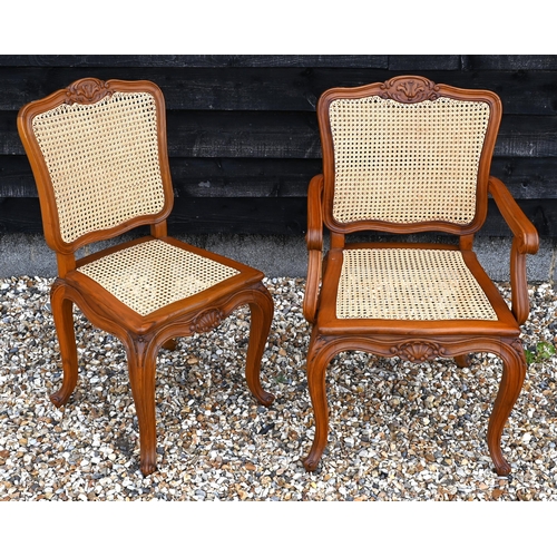42 - Twelve modern French walnut dining chairs with cane worked backs and seats in foliate carved frames ... 