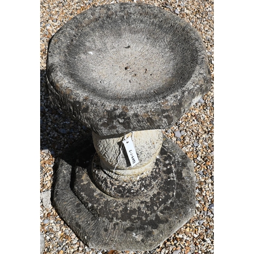 5 - A reconstituted weathered stone pedestal birdbath, 62 cm high