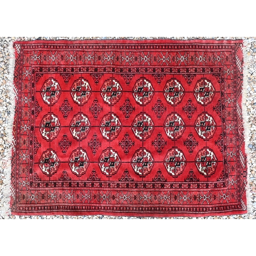 508 - A blue-ground Boteh rug 207cm x 110 cm to/with a red Turkoman rug 146 cm x 112 cm (2)