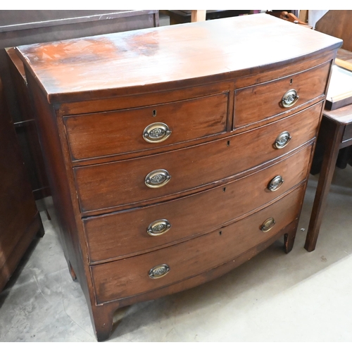 517 - A 19th century mahogany bowfront chest of two short over three long drawers raised on splayed bracke... 