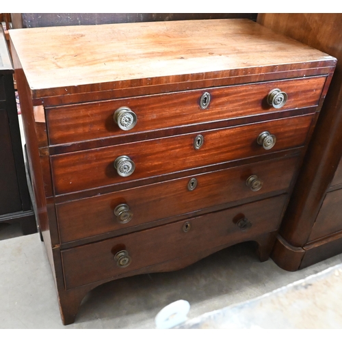 519 - A 19th century mahogany chest of four long graduating drawers with floral brass handles, 84 cm wide ... 