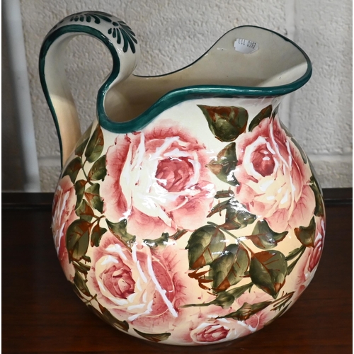 64 - Large Wemyss pottery globular jug, painted with roses, 24 cm high