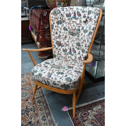 36 - An Ercol Windsor armchair with cushions