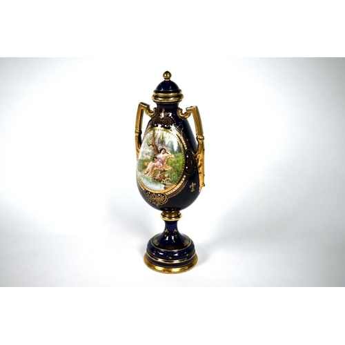 72 - A Vienna blue and gilt baluster vase and cover, printed and painted with Venus and Cupid, sleeping b... 