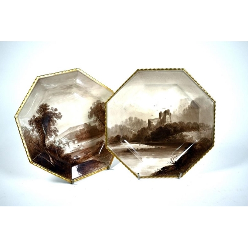 76 - A pair of Victorian Copeland pottery octagonal plates, sepia-painted with Brougham Castle and Norham... 