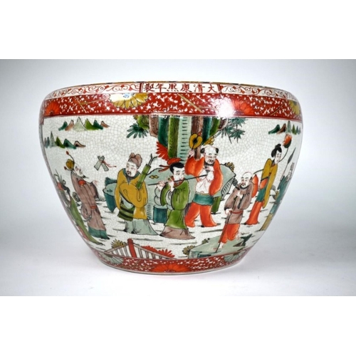 87 - A 20th century Chinese famille verte jardiniere with a large panel on each side featuring the eight ... 