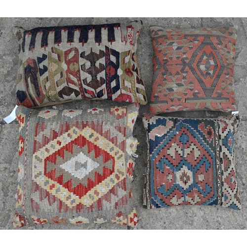 511 - Four various antique kelim cushions (4)