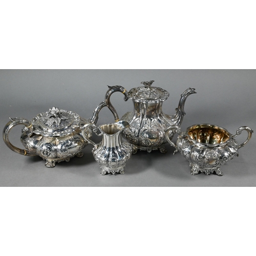 103 - A William IV/Victorian matched silver four-piece tea/coffee service of melon form with floral finial... 