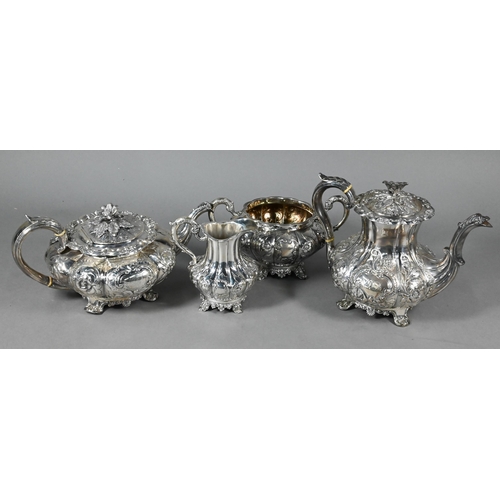 103 - A William IV/Victorian matched silver four-piece tea/coffee service of melon form with floral finial... 