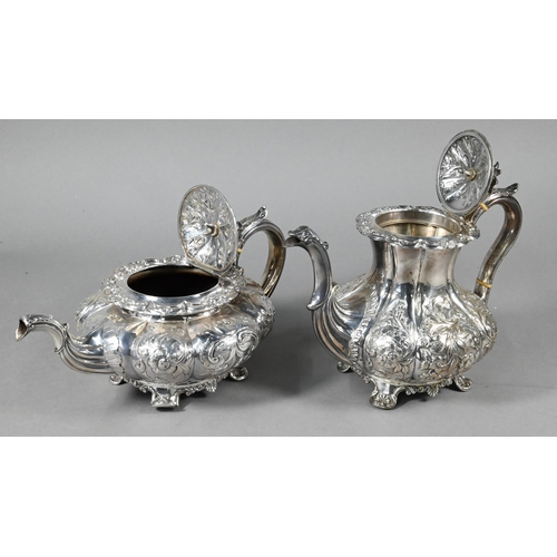 103 - A William IV/Victorian matched silver four-piece tea/coffee service of melon form with floral finial... 