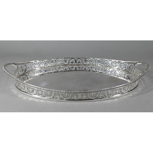 104 - A late Victorian Sheraton revival oval tray with foliate-pierced gallery and beaded rim, Charles Stu... 