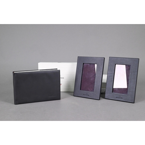 1063 - BA Concorde - Gifts - a leather-bound photograph album, five leather photograph frames, pair of oper... 