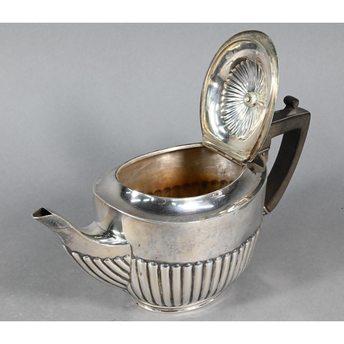 110 - An oval silver half-reeded bracket teapot with composite finial and handle, William Hutton & Son... 