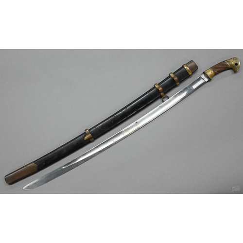 1112 - A World War II Cossack sword Shashka, the 81 cm slightly-curved blade dated 1940, the brass hilt wit... 