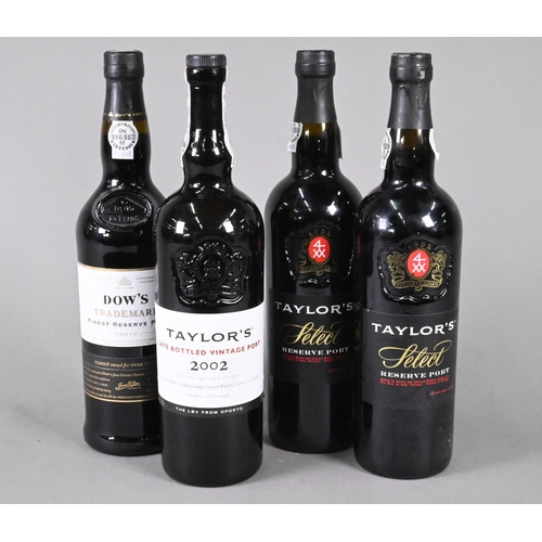 1144 - A bottle of Dow's Trademark Finest Reserve Port (c.2010), to/w a Tayor's 2002 vintage port and two b... 