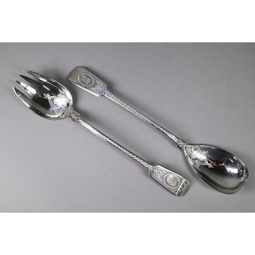 115 - Pair of silver fiddle pattern salad servers with engraved decoration, converted from George III bast... 