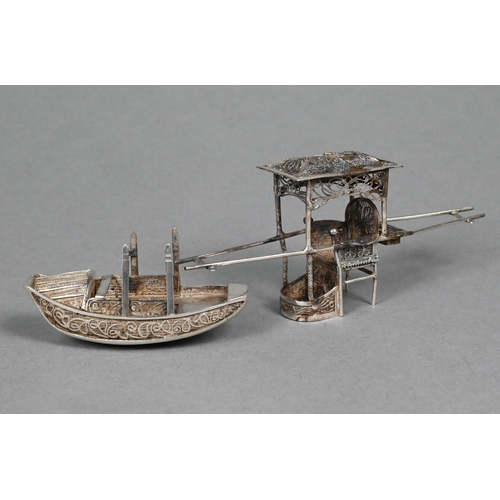 117 - A Chinese silver miniature sedan chair, to/w a sampan (2)