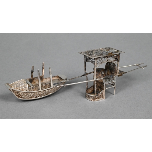 117 - A Chinese silver miniature sedan chair, to/w a sampan (2)