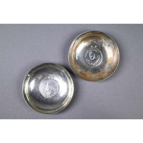 118 - Pair of Persian silver dishes inset with coins, 7 cm diam, to/w a low-grade white metal beaker (3)