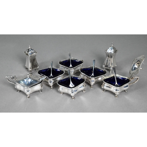 121 - A cased eight-piece silver condiment set with spoons, Selfridge & Co, Birmingham 1914/15, 9.5 oz... 