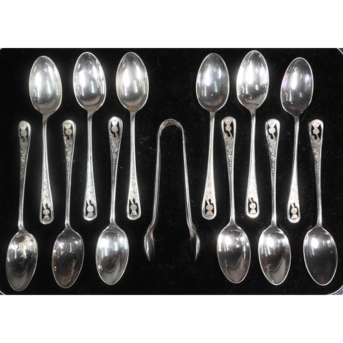 14 - Cased set of twelve epns teaspoons with pierced and engraved 'thistle' finials c/w tongs, to/w a cas... 