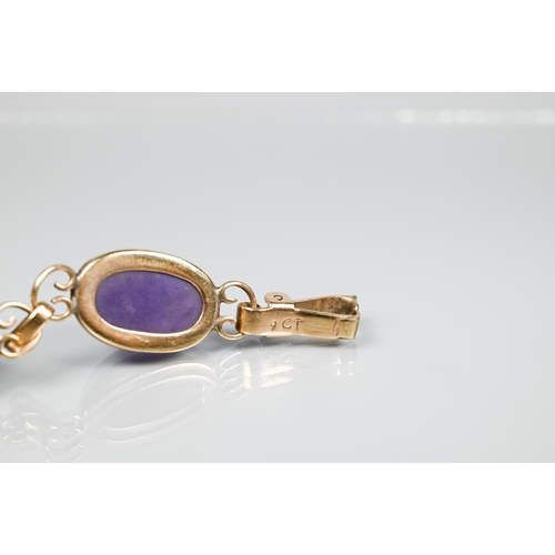 150 - An amethyst bracelet, the six oval cabochon stones with scroll links between, snap clasp, 18 cm long... 