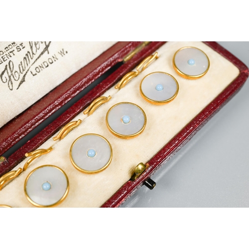 165 - Three cased sets of mother-of-pearl round studs and clips - two sets with turquoise enamel borders, ... 