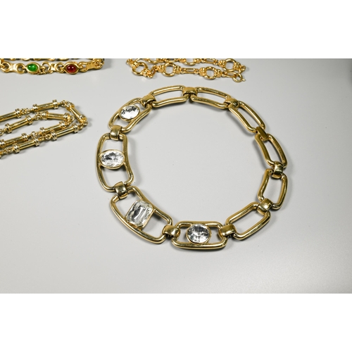 183 - A collection of vintage costume jewellery including gilt metal chains, paste set, necklaces and brac... 