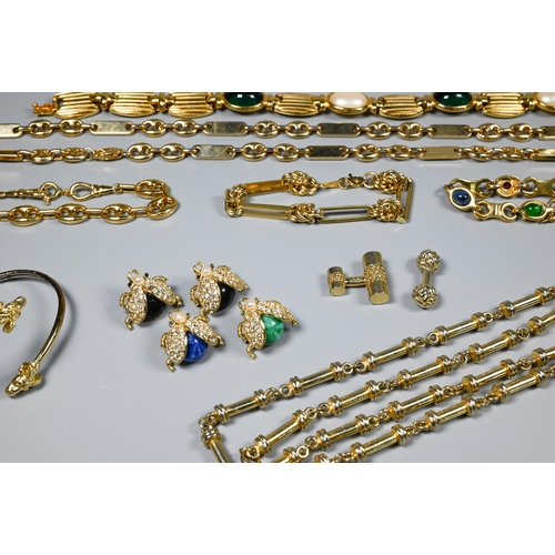 183 - A collection of vintage costume jewellery including gilt metal chains, paste set, necklaces and brac... 