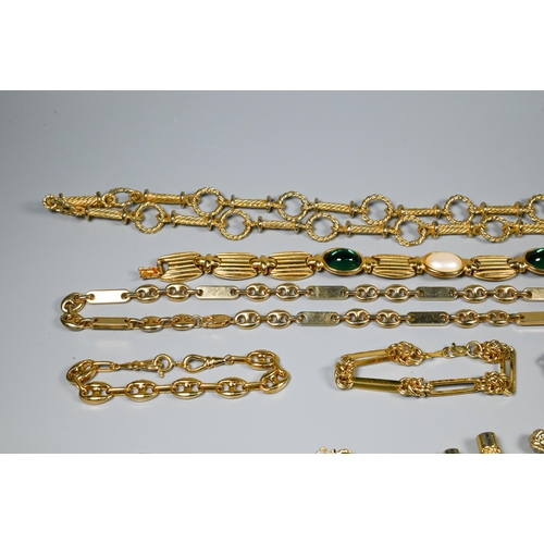 183 - A collection of vintage costume jewellery including gilt metal chains, paste set, necklaces and brac... 